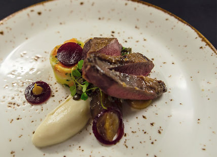 An image of a plate of food with meat, Seven Course Tasting Menu. Purslane