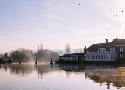 An image of a river with birds flying in the sky, 7-course tasting menu. Sindhu Restaurant