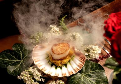 An image of a plate of food on a table, 7-course tasting menu. Sindhu Restaurant