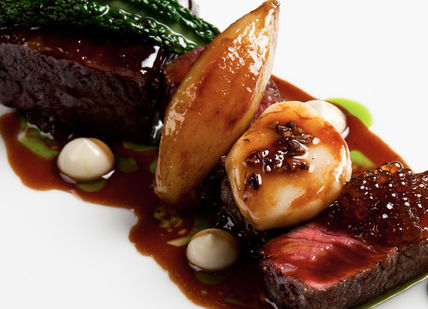 An image of a plate of food with meat, Michelin starred tasting menu. The Square