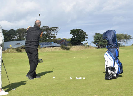 An image of a man playing golf, Golf Lesson and Supervised Play. St Andrews Golf Academy