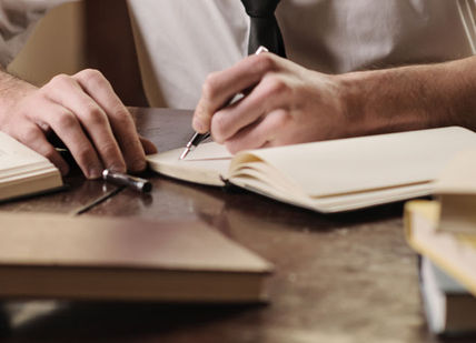 An image of a person writing