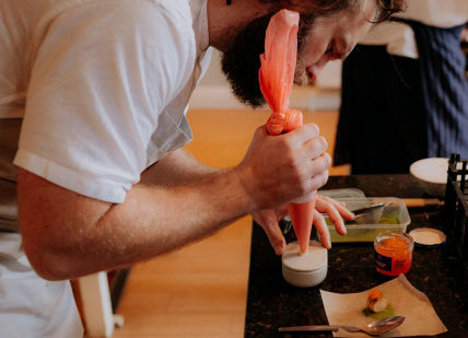 Chef Josh Barnes cooking