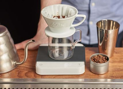 An image of a coffee maker and a cup of coffee, Coffee Brewing Masterclass. Union Brew Lab
