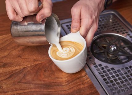 An image of someone pouring a cup of coffee, Espresso Masterclass. Union Brew Lab