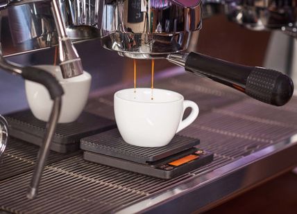 An image of a coffee machine making a cup of coffee, Espresso Masterclass. Union Brew Lab