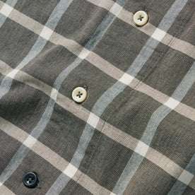 material shot of the buttons on The Short Sleeve Hawthorne in Espresso Plaid