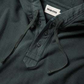 material shot of the placket of The Fillmore Snap Hoodie in Deep Sea Terry