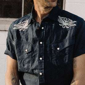 fit model wearing The Embroidered Short Sleeve Western in Indigo Linen