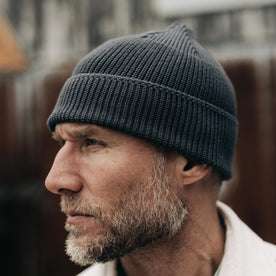 fit model showing the rib texture on The Rib Beanie in Granite