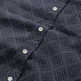 material shot of the buttons on The Short Sleeve Jack in Navy Diamond