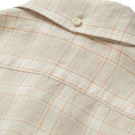 material shot of the back collar button on The Jack in Dune Plaid