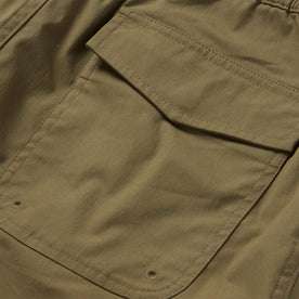 material shot of the back pocket of The Adventure Short in Olive
