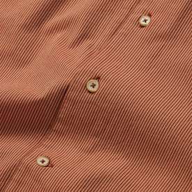 material shot of the buttons on The Tulum in Rust Stripe