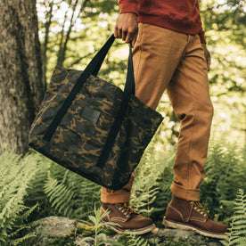 fit model carrying The Market Tote in Camo Boss Duck