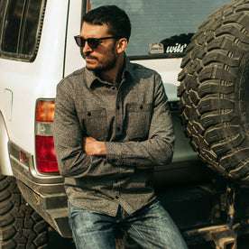 fit model with arms crossed while wearing The Utility Shirt in Salt and Pepper Twill
