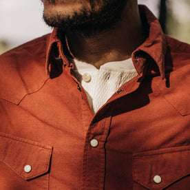 fit model wearing our shirt close up with the collar unbuttoned