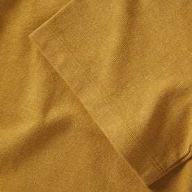 material shot of the sleeve on The Heavy Bag Tee in Honey