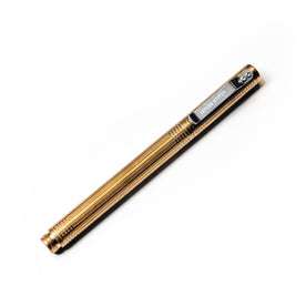 flatlay of The Pen in Brass