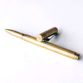 material shot of the cap and pen on The Pen in Brass