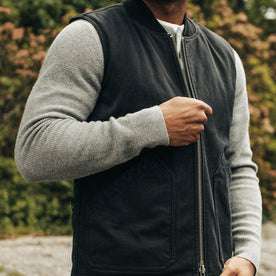 fit model zipping up The Workhorse Vest in Coal Boss Duck
