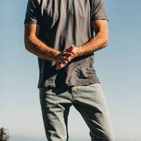 our fit model wearing The Standard Issue Tee in Navy Hemp—cropped shot from chest down