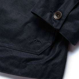 material shot of sleeve cuff of The Task Jacket in Waxed Navy