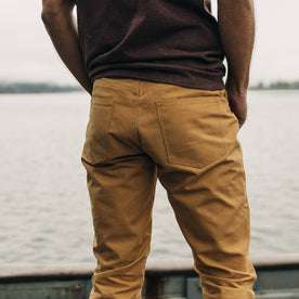 fit model showing back pockets of The Wharf Pant in British Khaki Selvage