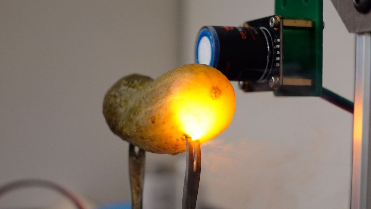 The Physics Behind Glowing Pickles: Electrolysis, Sparks, and a Salty Brine