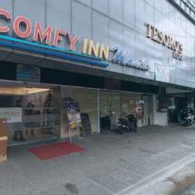 컴피 인 마비니 마닐라 1, 니노이 아키노 스타디움 호텔