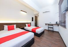 침실 4 Madras Hotel