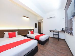 침실 4 Madras Hotel