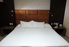 ห้องนอน 4 Village Premium Hotel