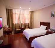 Bedroom 6 GreenTree Inn Heze CBD Railway Station Wanda Plaza Business Hotel