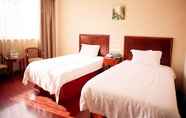 Bedroom 7 GreenTree Inn Heze CBD Railway Station Wanda Plaza Business Hotel