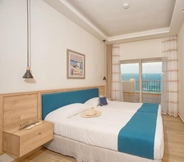 Kamar Tidur 4 Hotel and Studios Cavos Bay