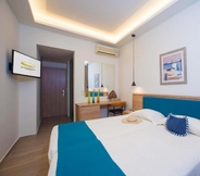 Kamar Tidur 3 Hotel and Studios Cavos Bay