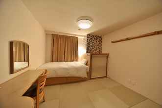 Bedroom 4 APA Hotels