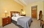 Bedroom 5 Genetti Hotel SureStay Collection By Best Western