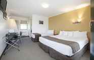 Bedroom 5 Riverside Hotel Motel