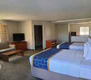 ห้องนอน 5 Days Inn & Suites by Wyndham Orlando East UCF Area