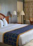 BEDROOM Days Inn & Suites by Wyndham Orlando East UCF Area