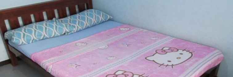 Kamar Tidur Aysha Lily Cebu Guest House