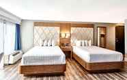 Bedroom 4 Hilton Head Metropolitan Hotel