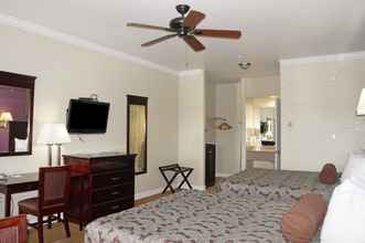 Bedroom 4 Rodeo Lodge (ex Americas Best Value Inn and Suites-Clovis/Fresno)
