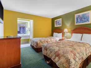 Bedroom 4 Rodeway Inn and Suites