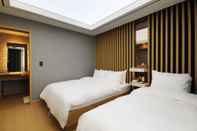 ห้องนอน Elysee Hotel