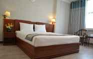 Phòng ngủ 2 Pravina Hotel