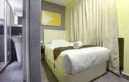 Kamar Tidur 6 Grand Village Hotel