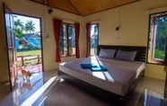 Phòng ngủ 2 Isara Lanta Resort